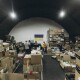 Стіни волонтерського штабу «Ангар» прикрашає стяг із Криму