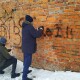 Стіни Луцького замку відчистили від написів вандалів