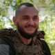 Воїн волинської бригади читає сину гуморески з передової
